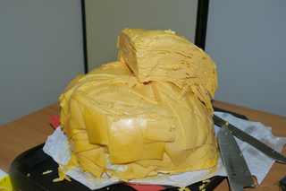 Illustration for article titled A Whopper with 1,000 Slices of Cheese Will Horrify and Disgust You